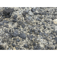 1881.
蘭嶼全島主要由安山岩質的火山碎屑物、珊瑚礁碎屑所組成，因此照片中的集塊岩可說是隨處可見。可想像過往海底火山猛烈噴發的情景，火山碎屑物在海面下沉積、堆疊並膠結成岩體後，受板塊擠壓而漸漸隆升。
