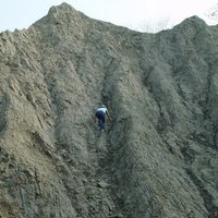 月世界泥岩惡地為台灣西南部泥岩區的一部分。泥岩常有陡峭裸露或寸草不生的景觀，並以裸露的稜脊和陡峭的溝谷相間為其特色。