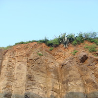 Basaltic columns and red soil profiles
